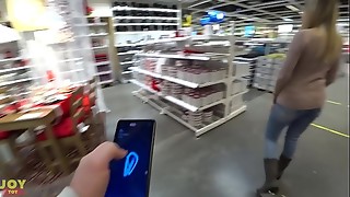 Remote controlled magic wand while shopping
